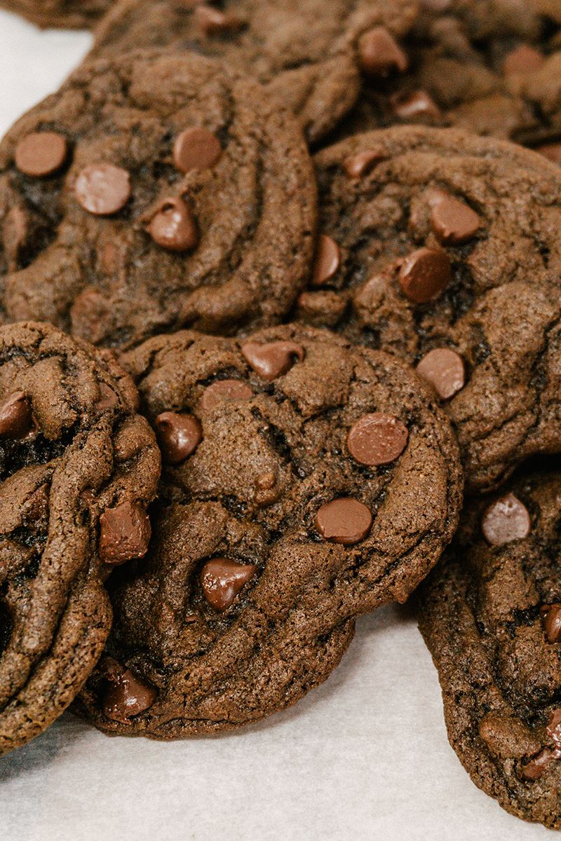 taste before beauty double chocolate chocolate chip cookie on parchment