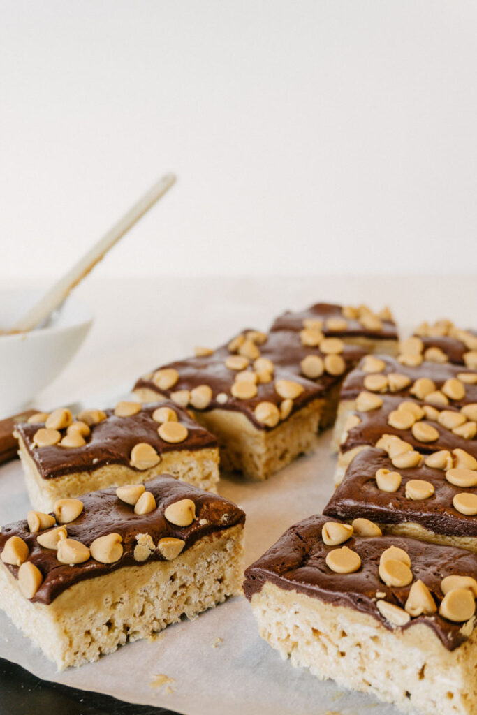 taste before beauty peanut butter chocolate rice crispys on parchment paper