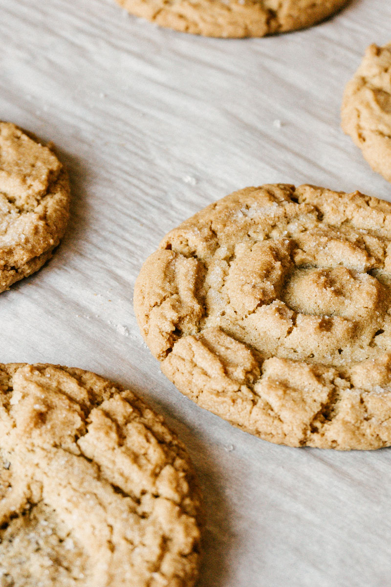 taste before beauty peanut butter cookies on parchment paper