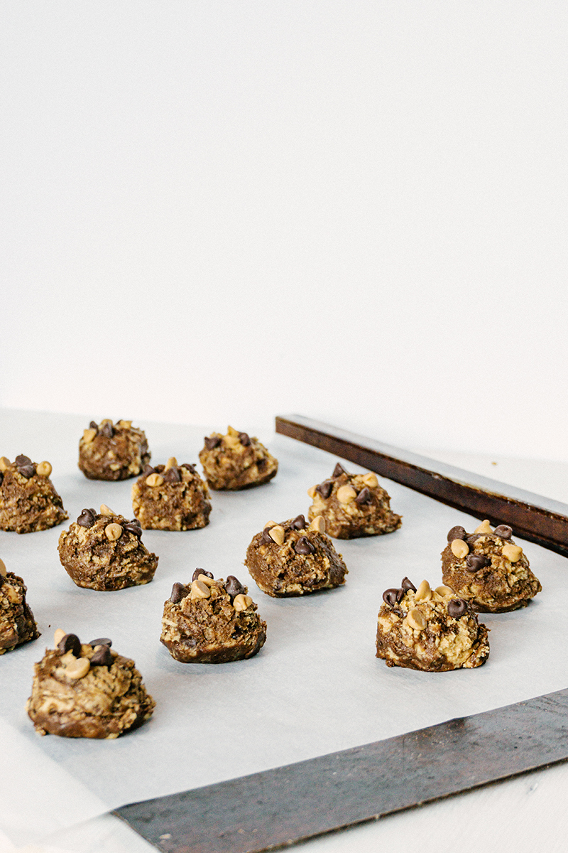 pennsylvania tango peanut butter choocolate cookie dough balls on cookie sheet pan and parchment paper