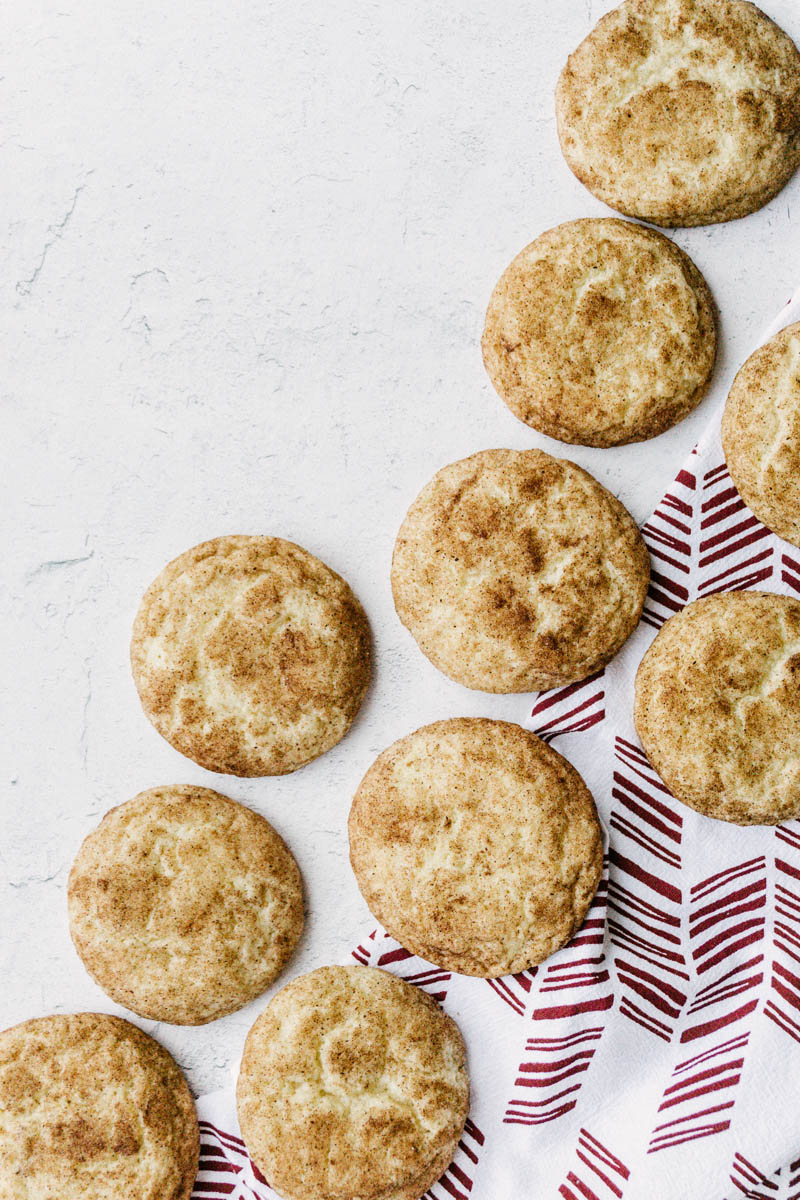 taste before beauty the best snickerdoodle cookies layed out with kitchen towels