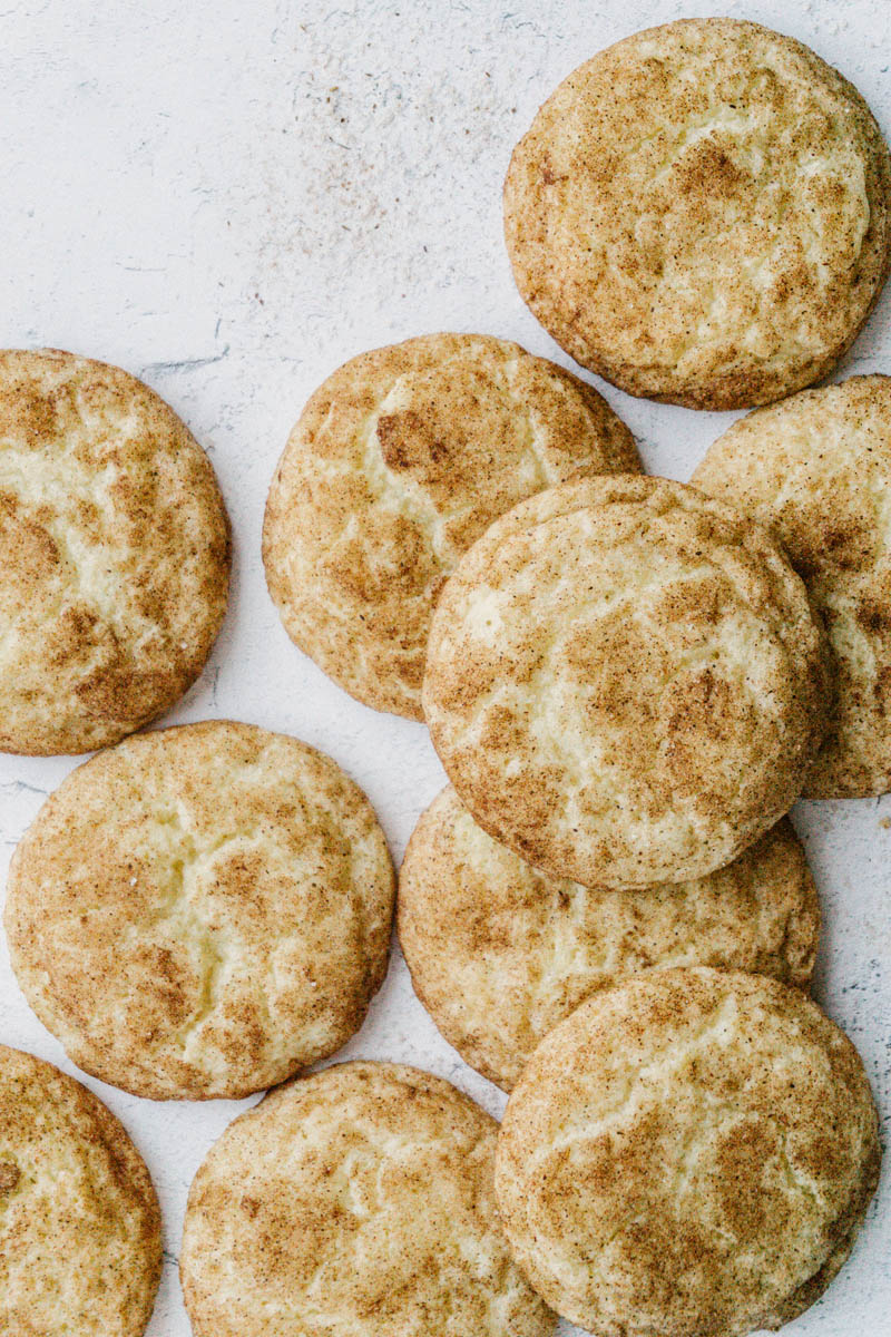 taste before beauty the best snickerdoodle cookies piled up on table