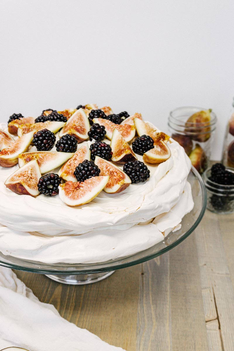 taste before beauty stacked cracked pavlova with berries