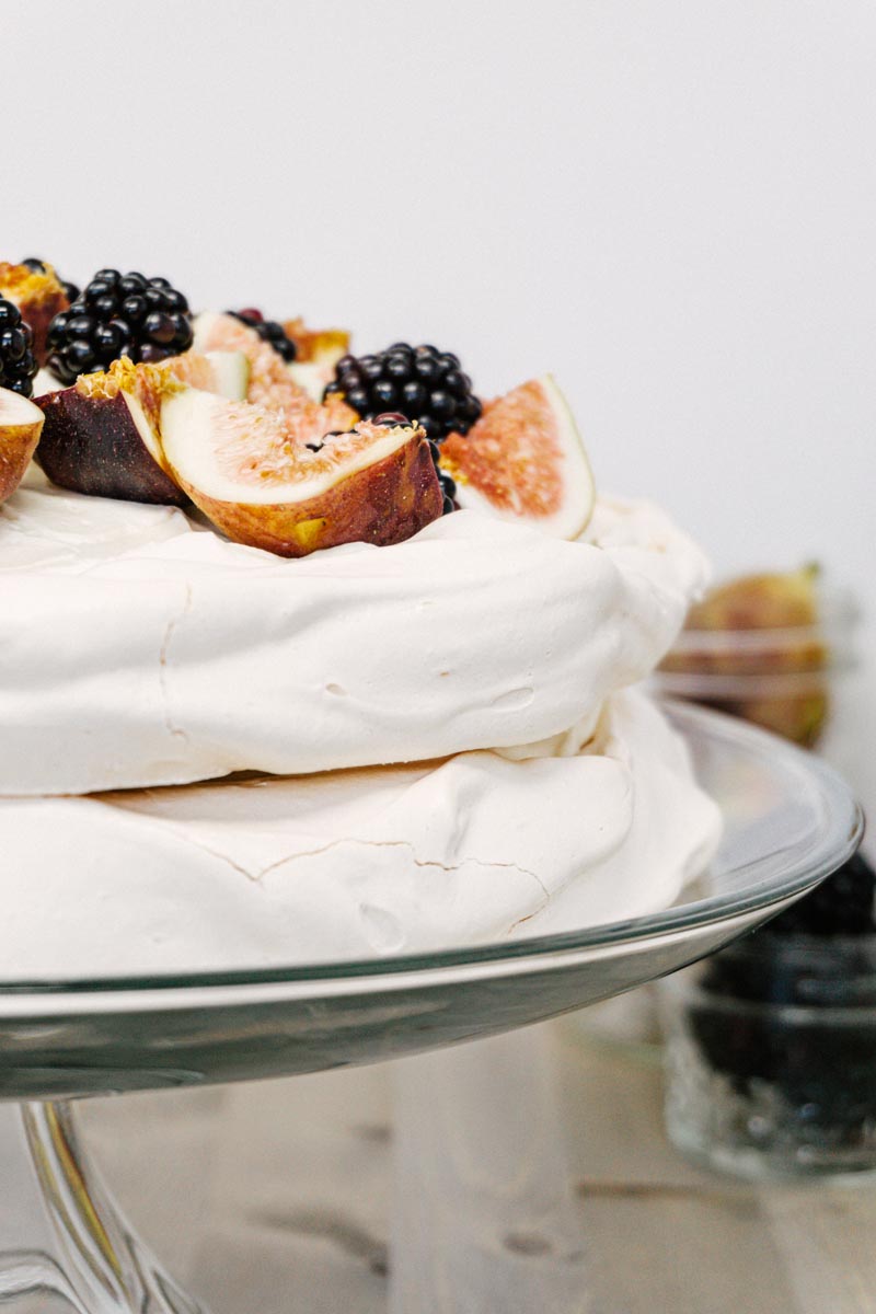 taste before beauty stacked cracked pavlova with berries