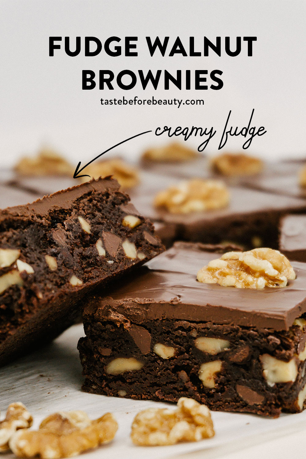 taste before beauty fudge walnut brownies stacked with each other with walnuts in the front pinterest pin