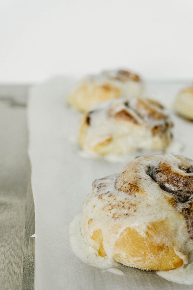 taste before beauty buttery soft cinnamon rolls on parchment paper