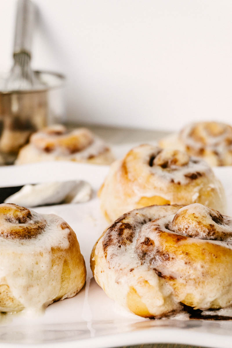 cinnamon rolls with a cream cheese frosting drizzle