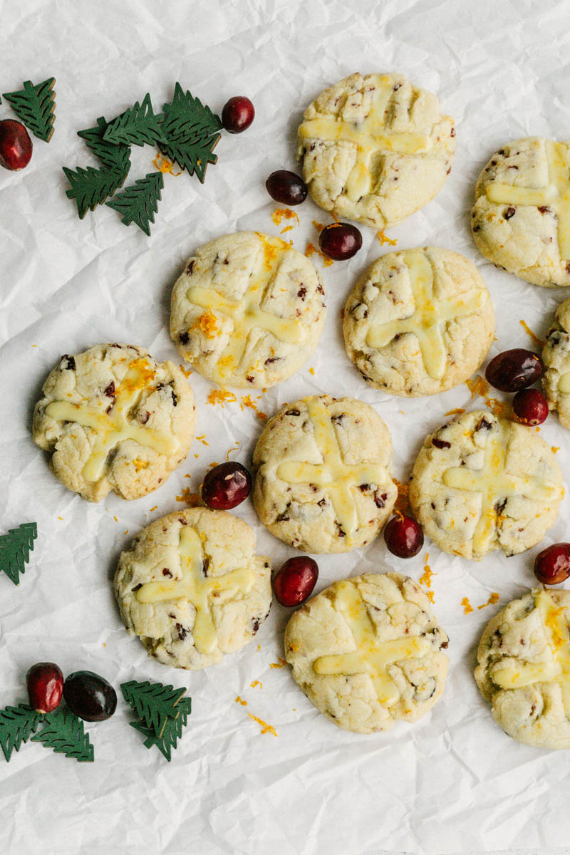 taste before beauty cranberry orange shortbread cookies together on parchment paper