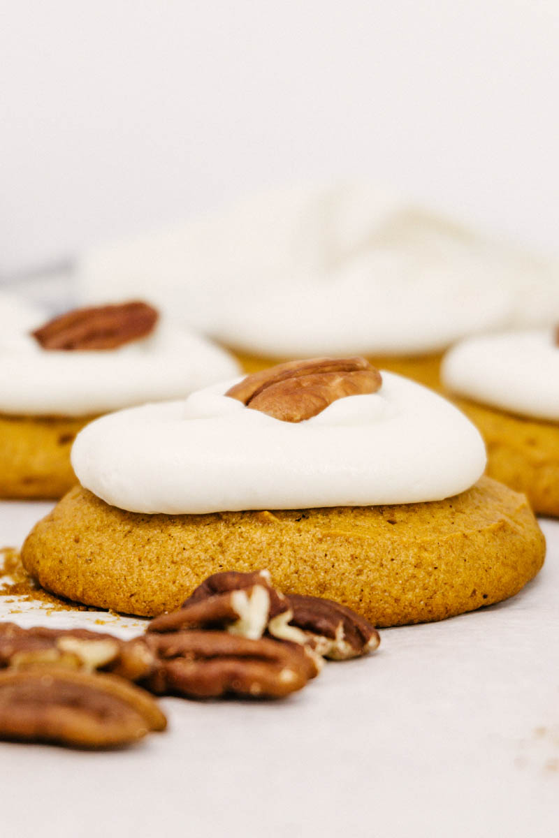 pumpkin cookie with cream cheese frosting and walnut