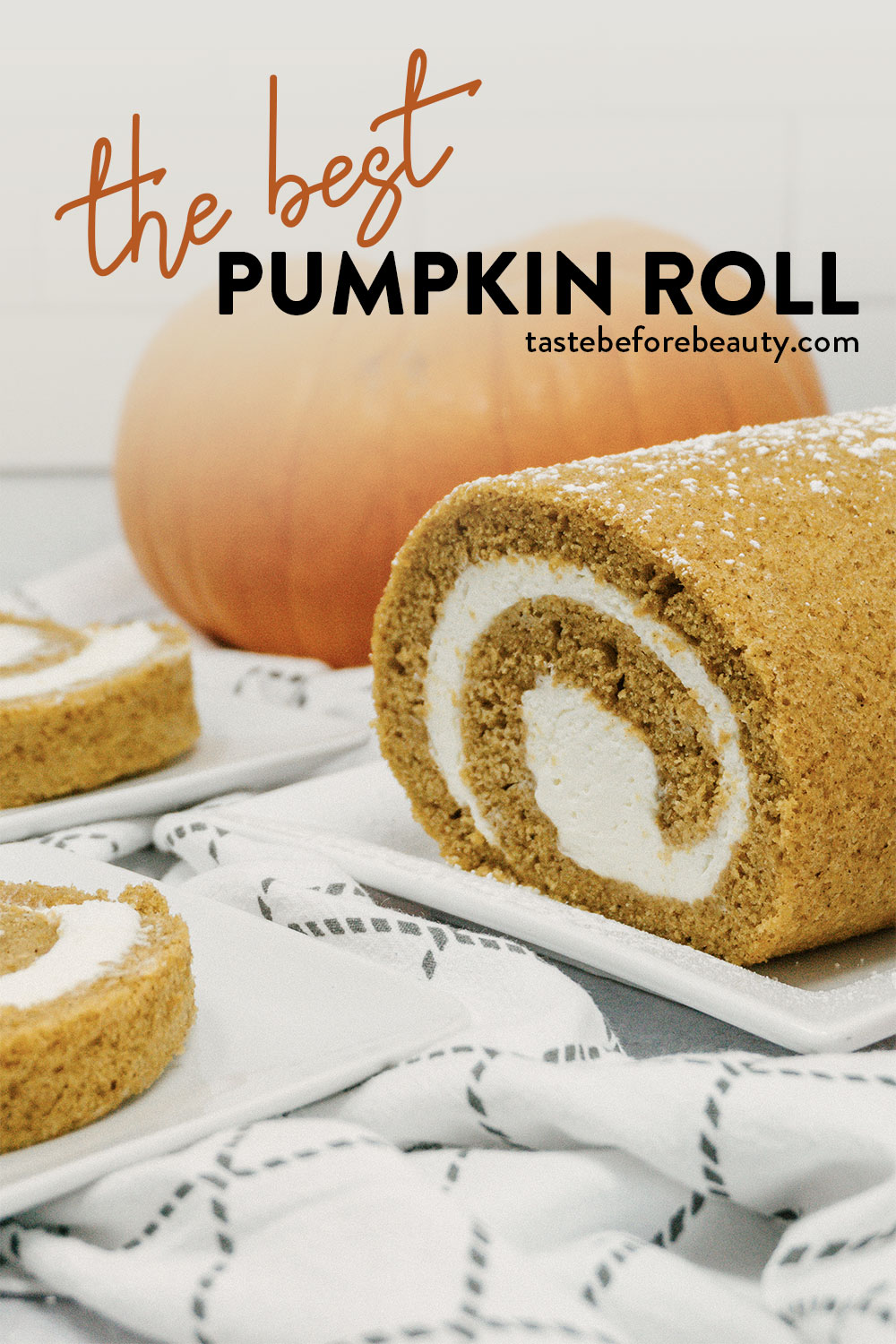 taste before beauty pumpkin roll with cream cheese frosting cut open with slices