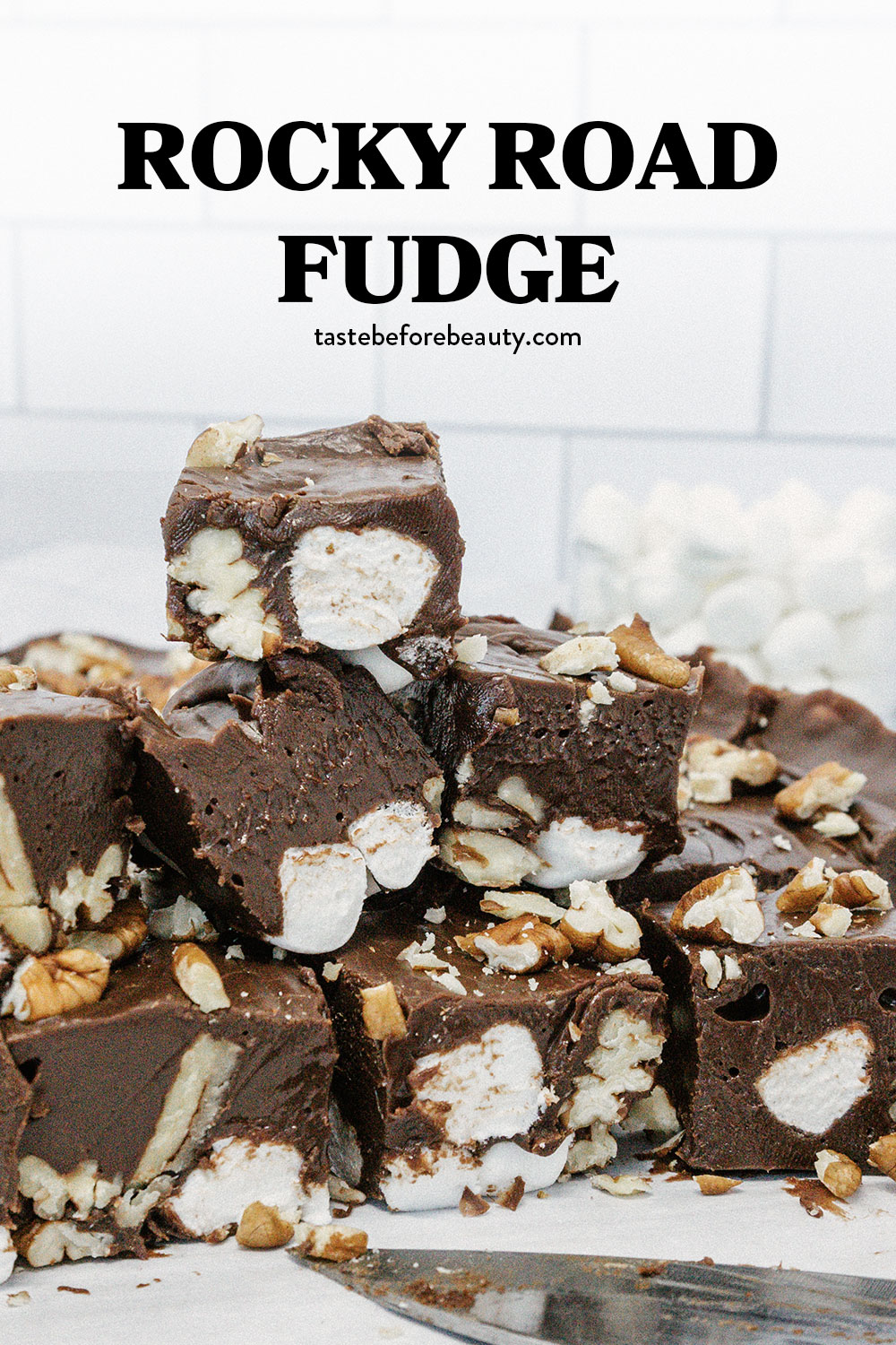 taste before beauty chocolate rocky road fudge pieces cut and stacked on top of each other with marshmallows and nuts inside pinterest pin