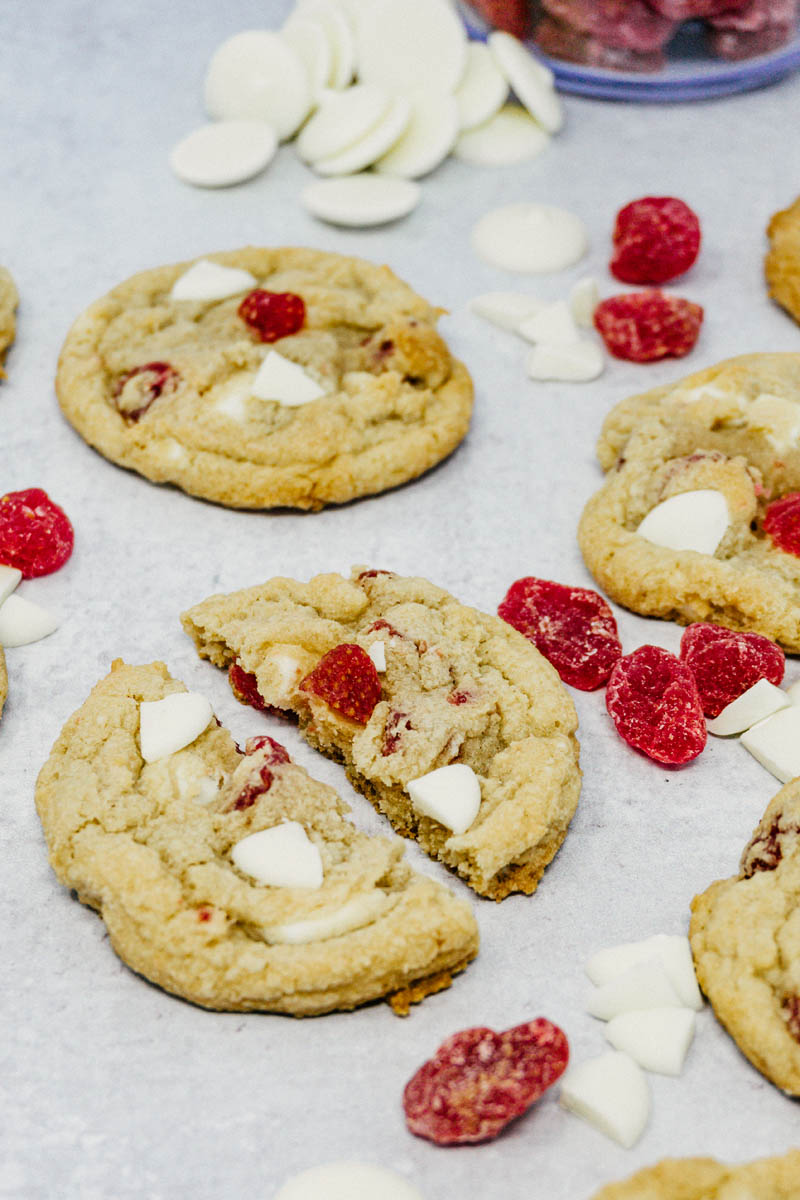 taste before beauty strawberry white chocolate cookies split open on table