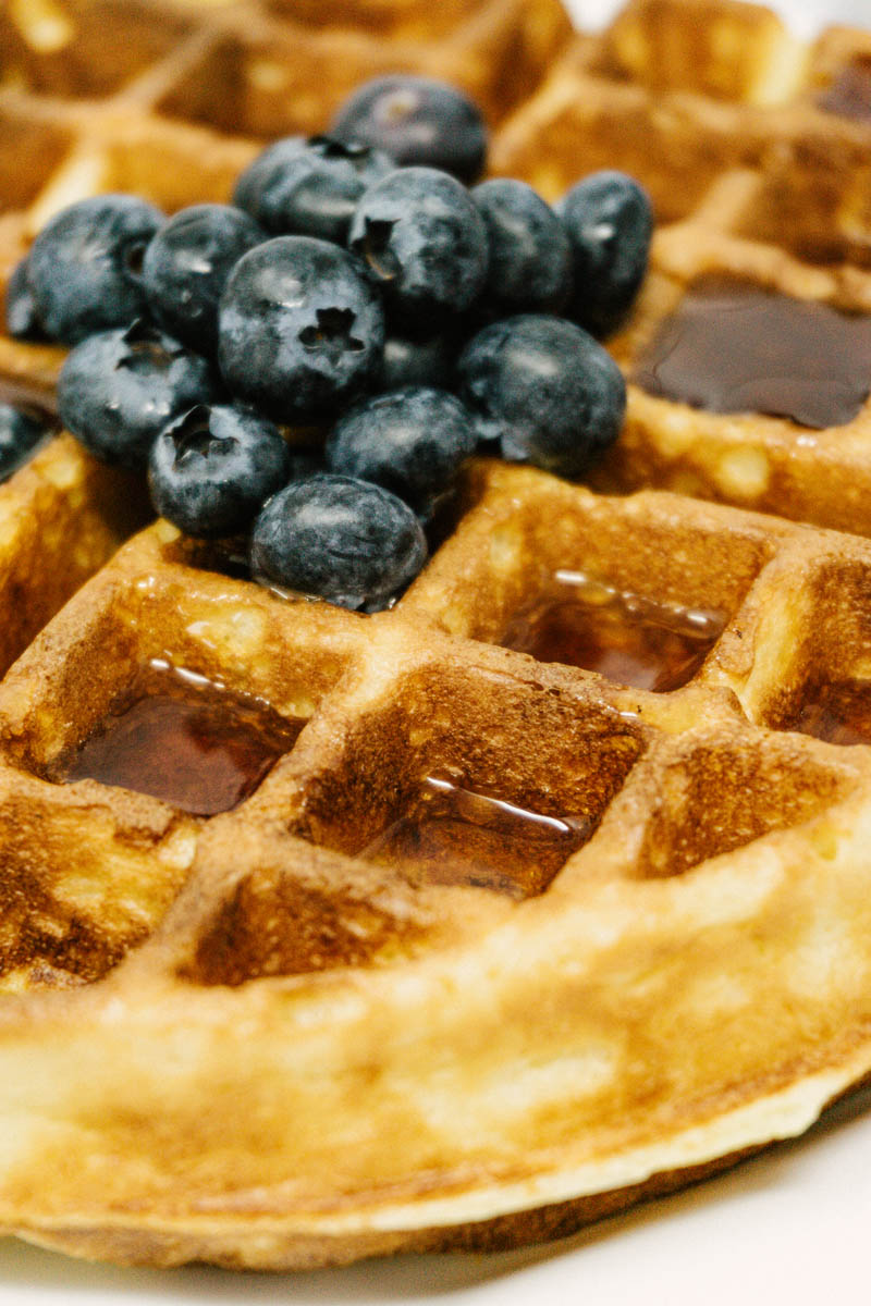 taste before beauty french waffle with blueberries and syrup on top