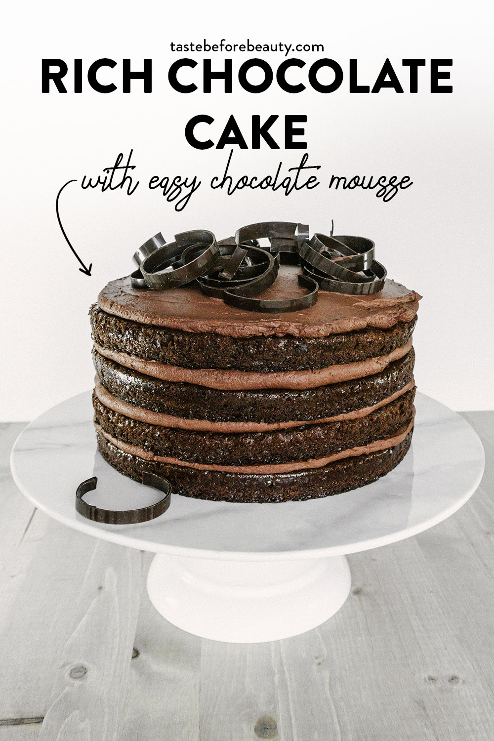 taste before beauty rich chocolate cake with easy chocolate mousse on stand with chocolate swirls pinterest pin