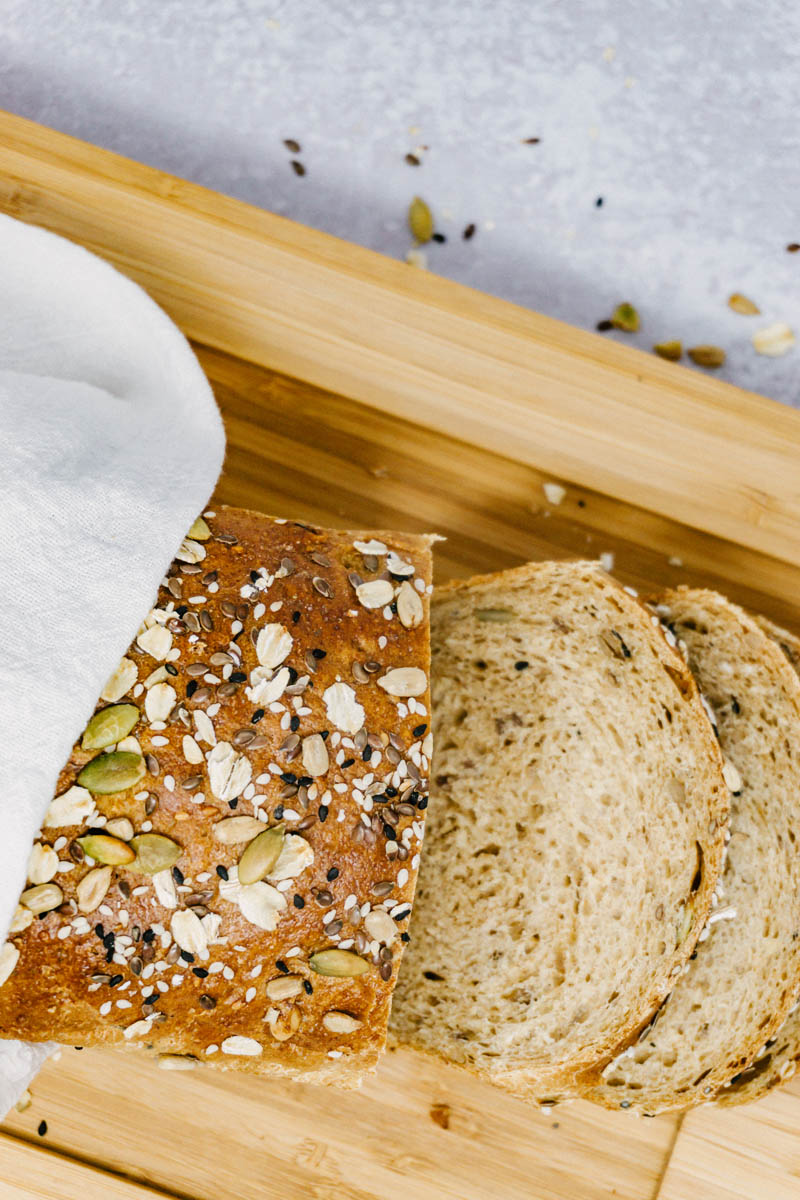 taste before beauty wheat oat seed bread cut slices with towel