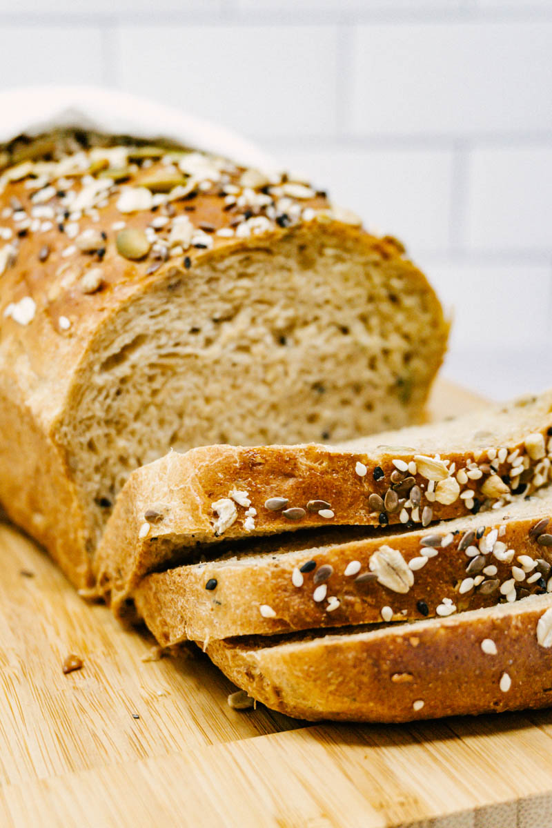 taste before beauty wheat oat seed bread cut open with slices