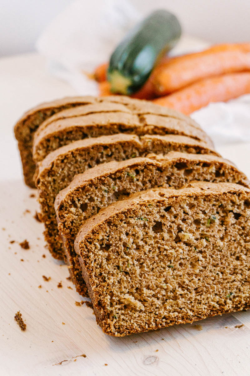 taste before beauty easy zucchini bread slices on cutting board