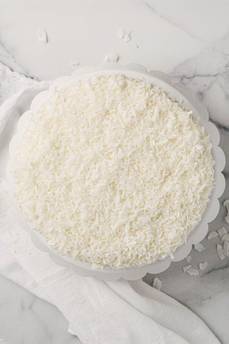 taste before beauty sweet coconut cake on cake stand and marble top