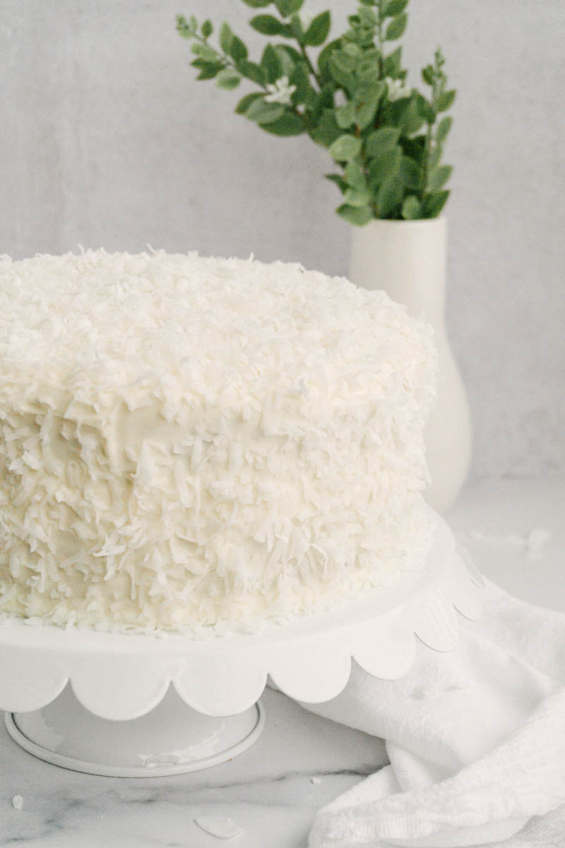 taste before beauty sweet coconut cake on cake stand
