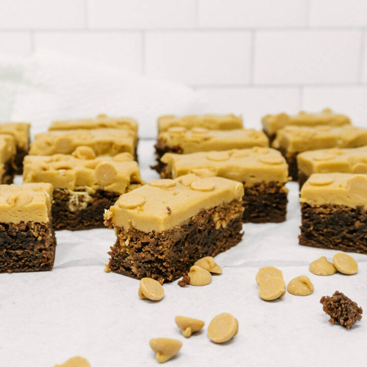 taste before beauty peanut butter brownies on table with peanut butter chips