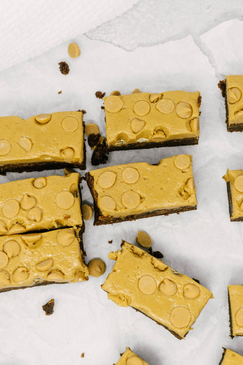 taste before beauty peanut butter brownies lined on table