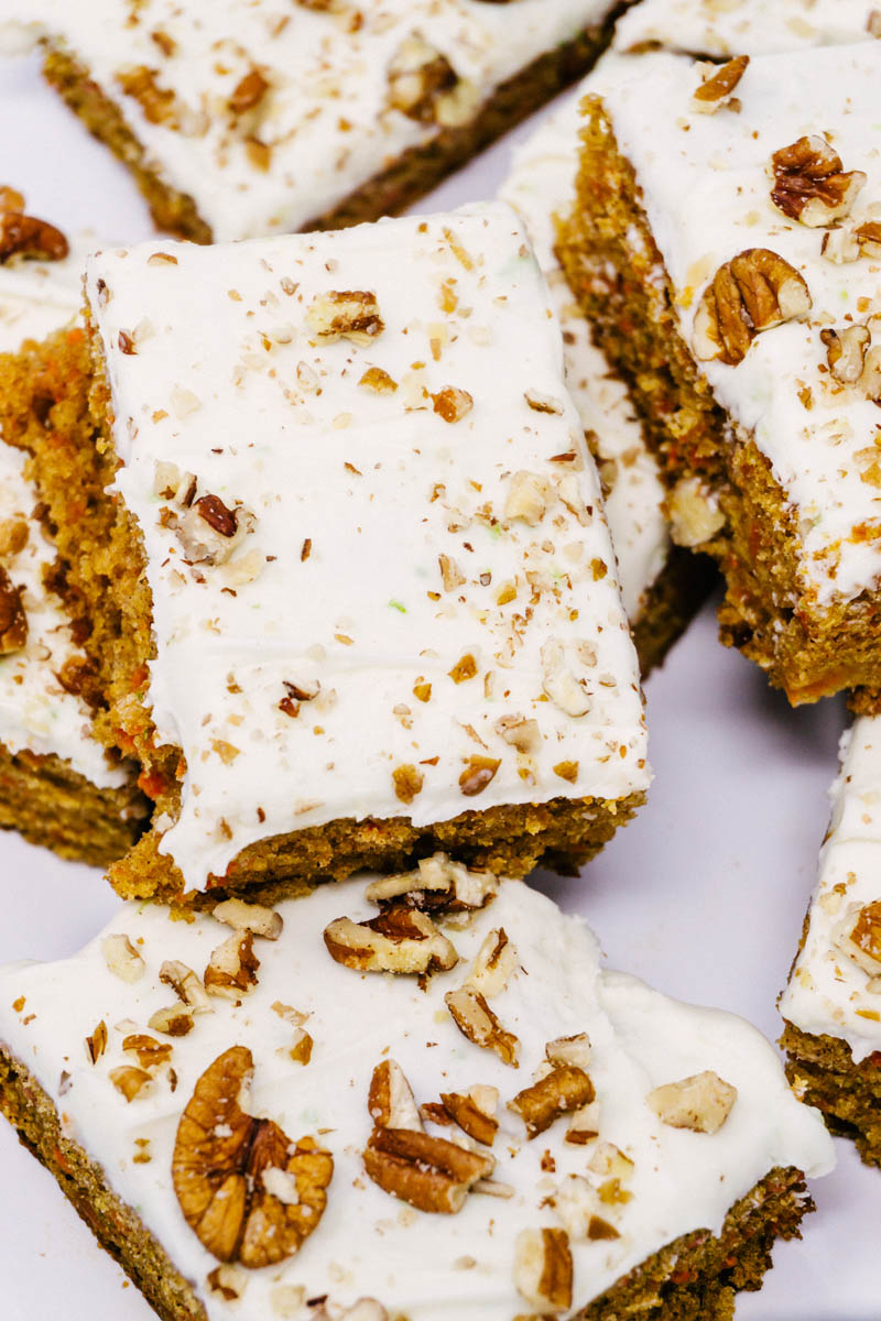 taste before beauty Carrot Cake Bars with Sweet Lime Cream Cheese Frosting layed on each other