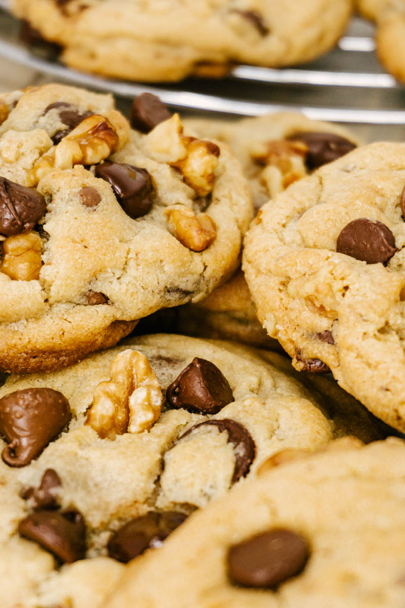 taste before beauty triple chocolate chip walnut cookies stacked on each other