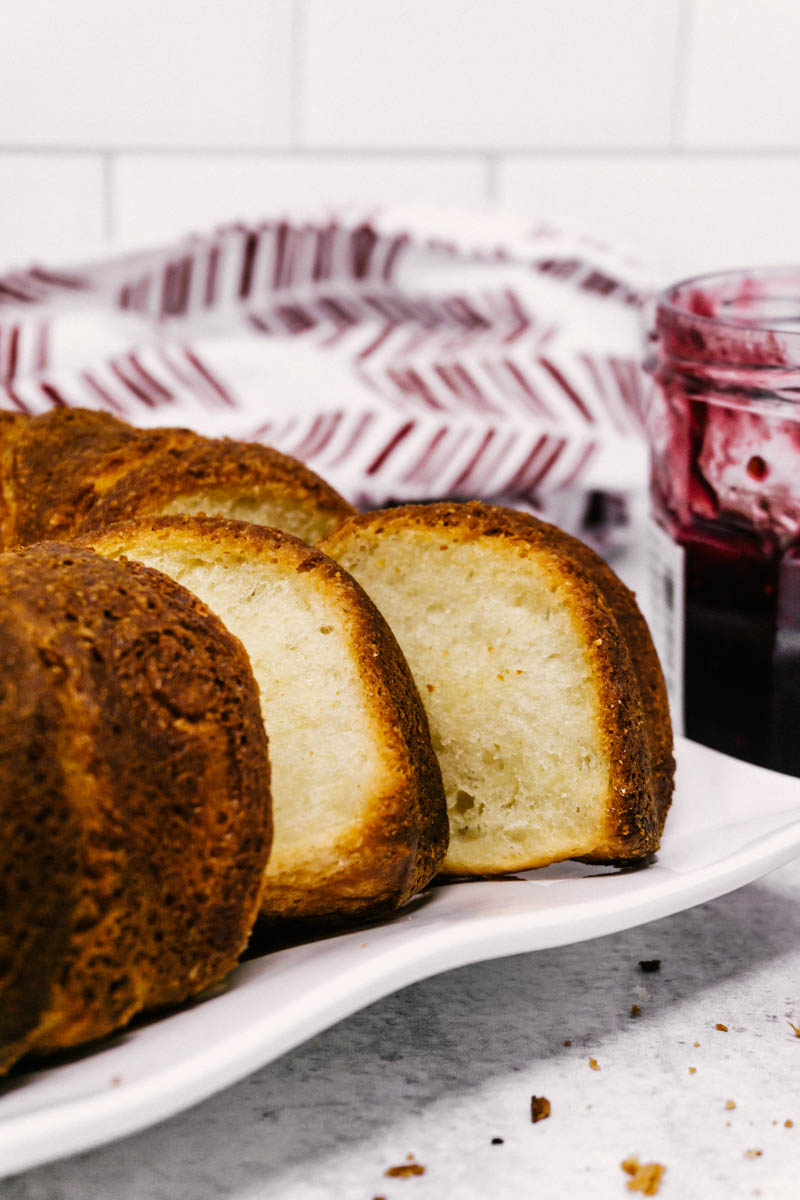 taste before beauty overnight bundt pan potato rolls on plate with slices