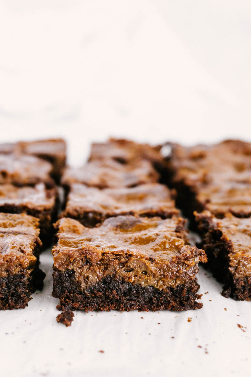 dulce de leche brownies cut into squares on the table