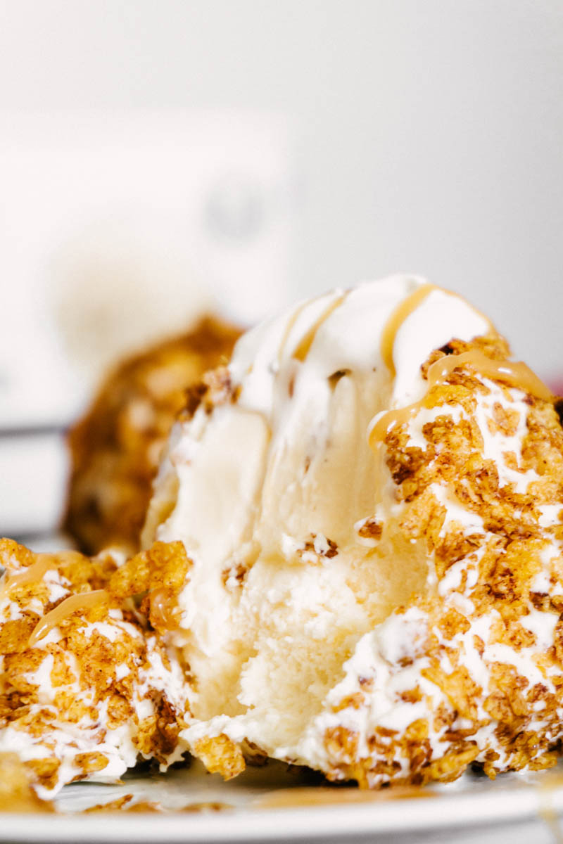 easy fried ice cream balls with cinnamon crunchy coating opened up