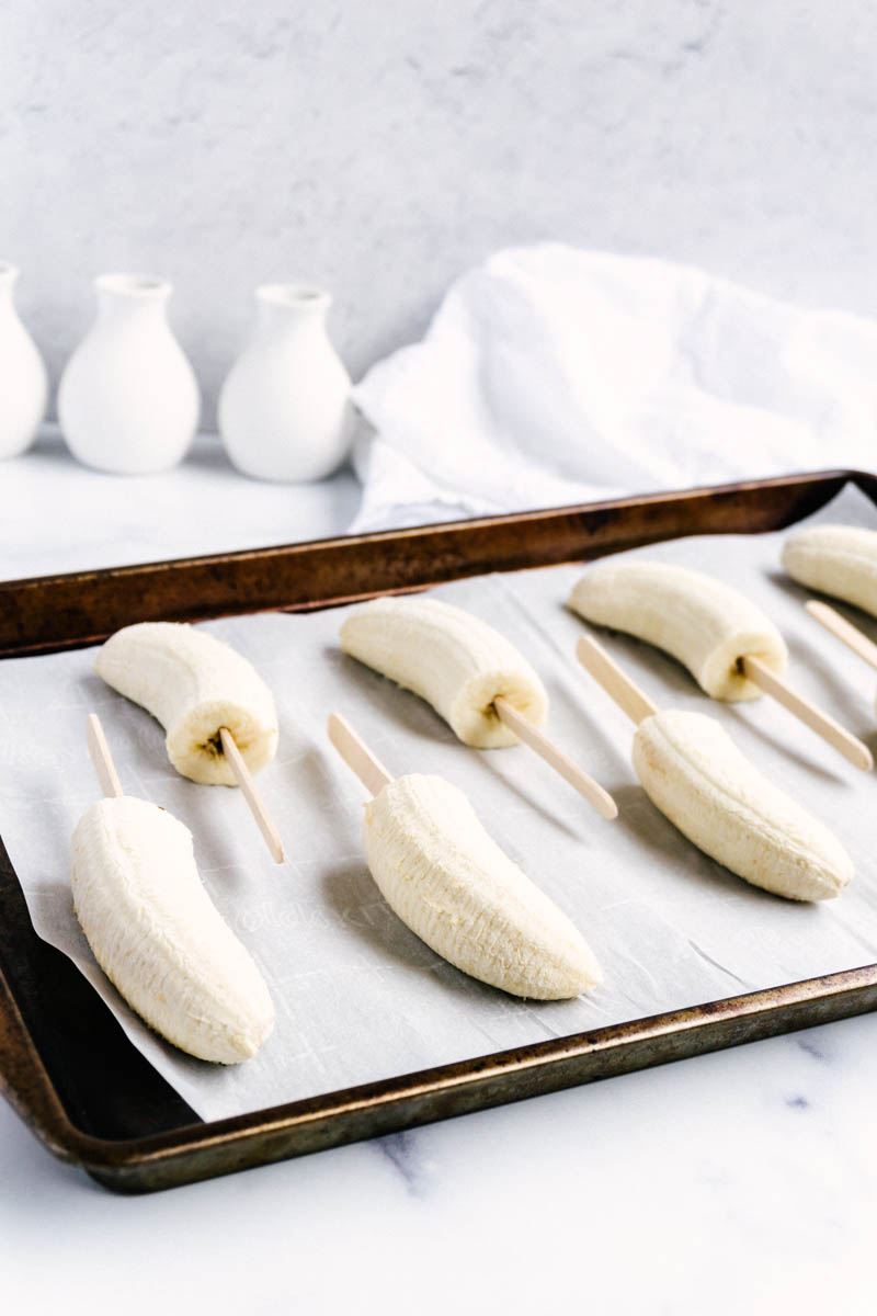 frozen bananas on baking sheet