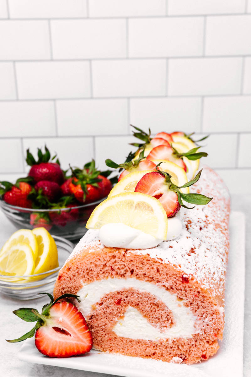 strawberry lemon cake roll on plate