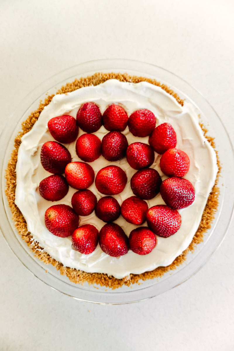 strawberry pie with berries on top