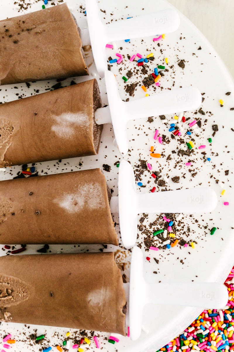 fudgesicles on table with sprinkles