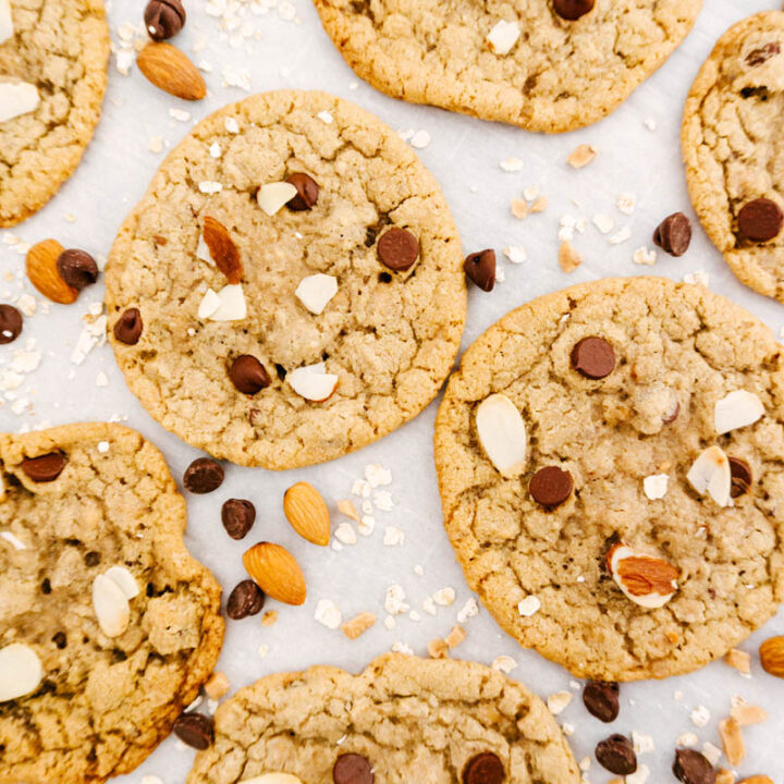 oat toffee almond cookies on parchment paper