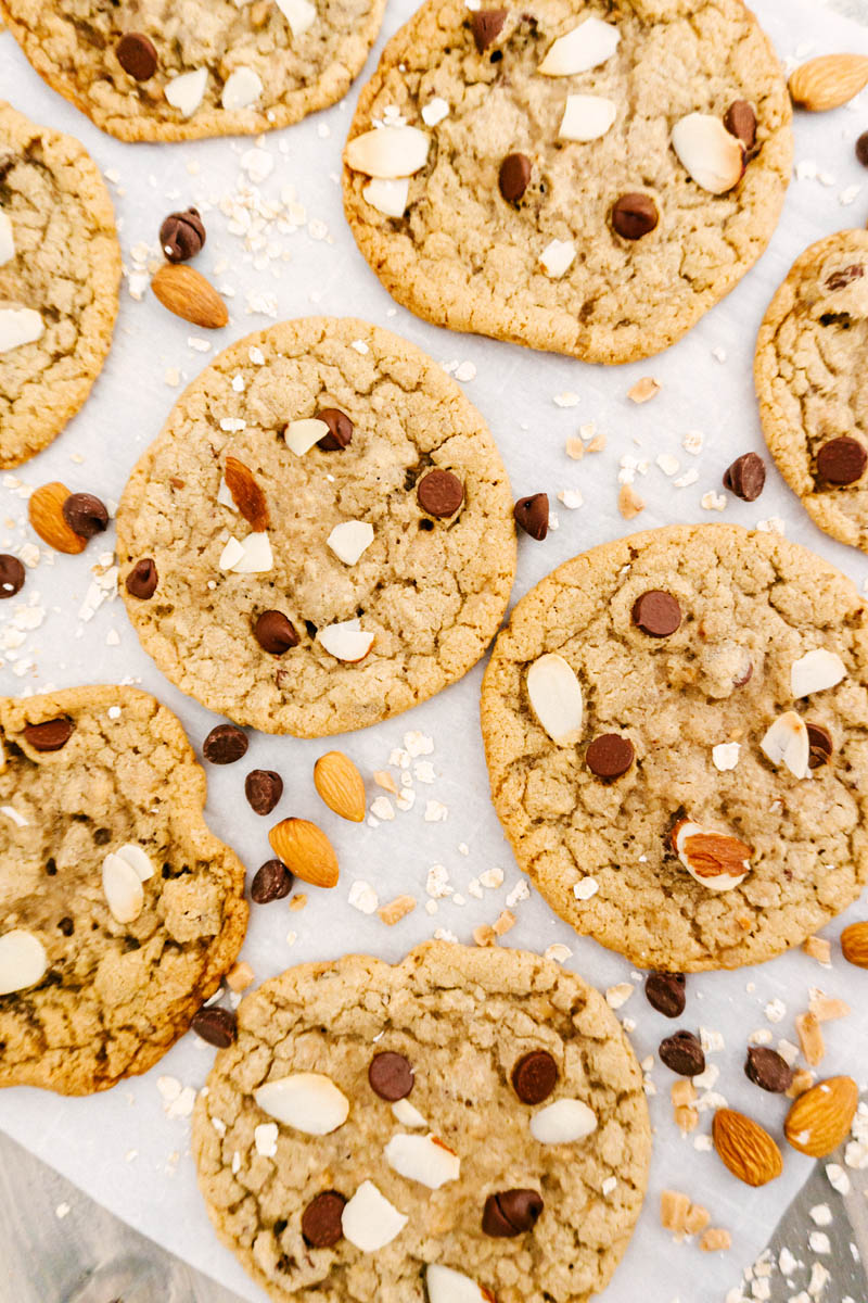 oat toffee almond cookies on parchment paper