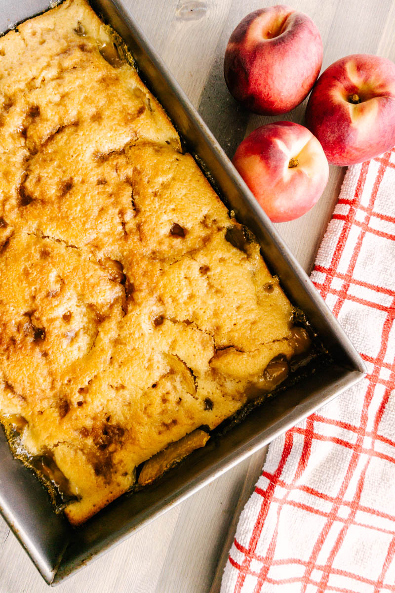 peach cobbler in pan