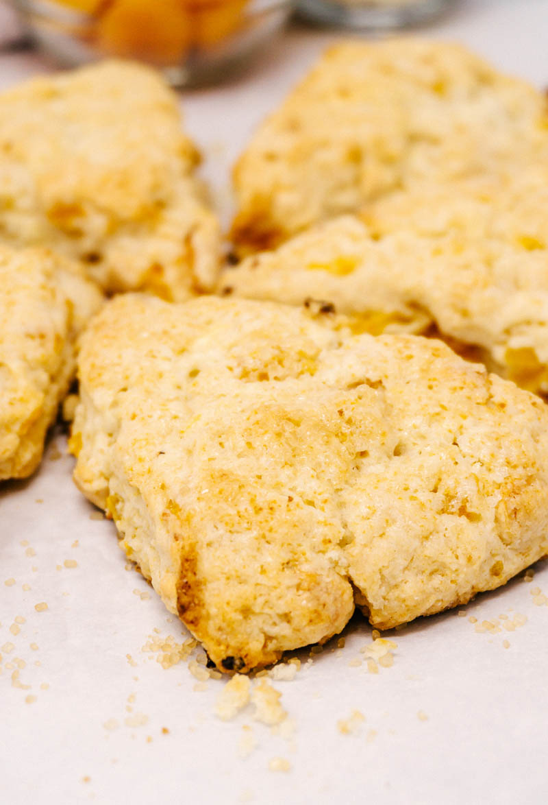 apricot white chocolate scones layed on table