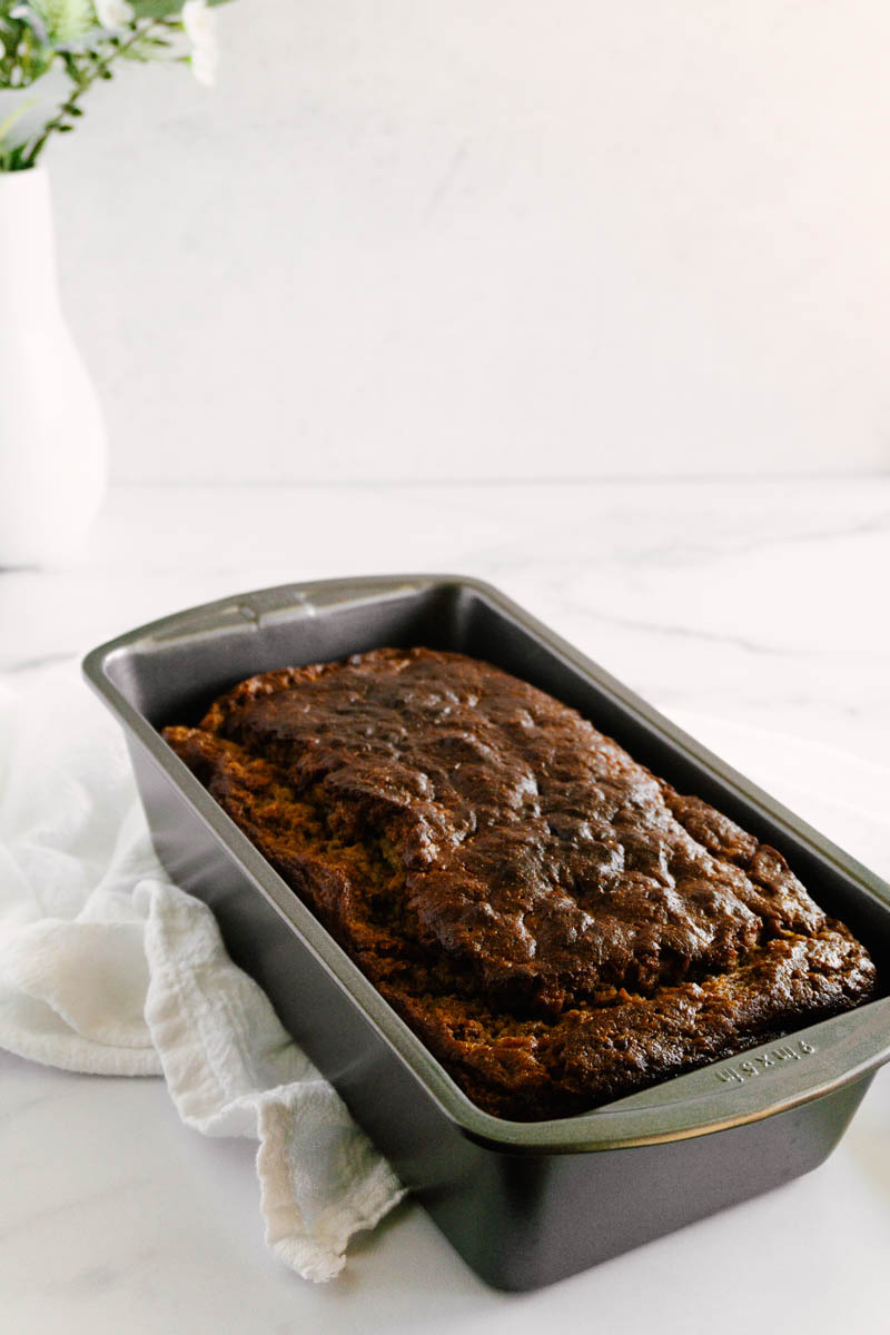 chai spice banana bread in pan on the table