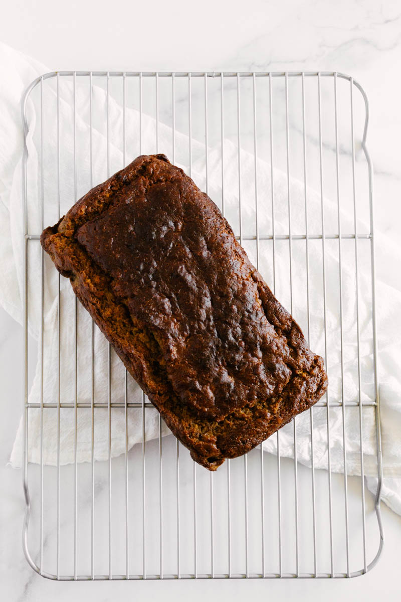 flatlay of chai spice banana bread on wire rack