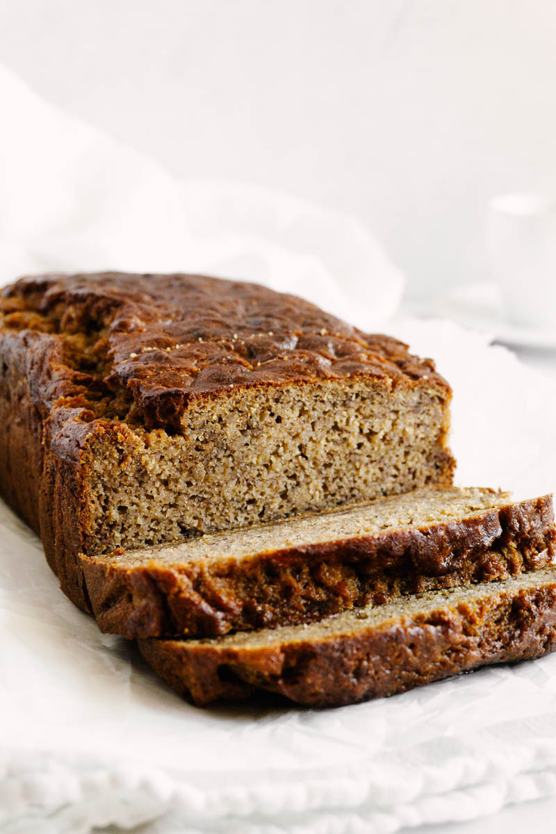 chai spice banana bread with two cut pieces