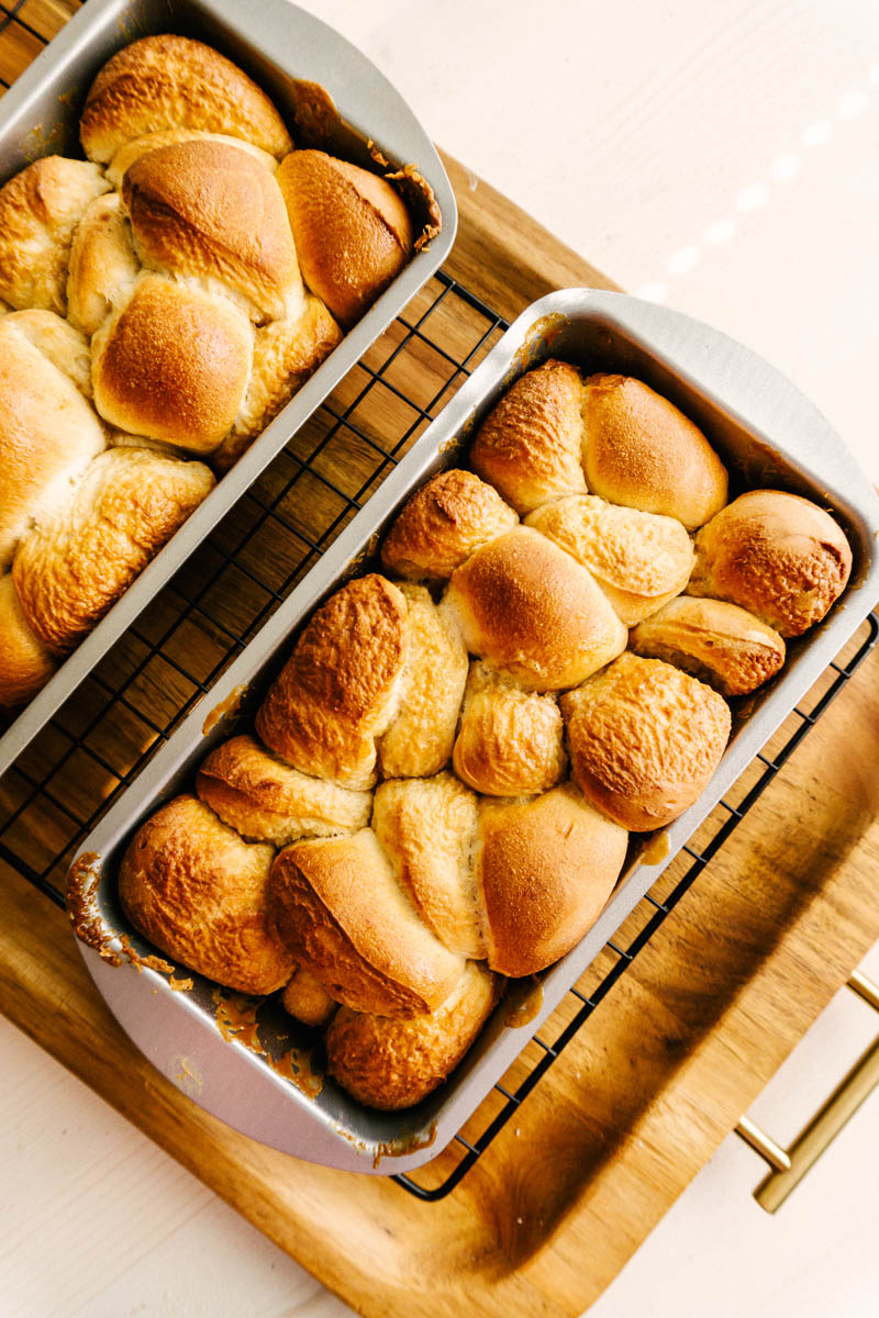 risen easy monkey bread rolls in bread pans