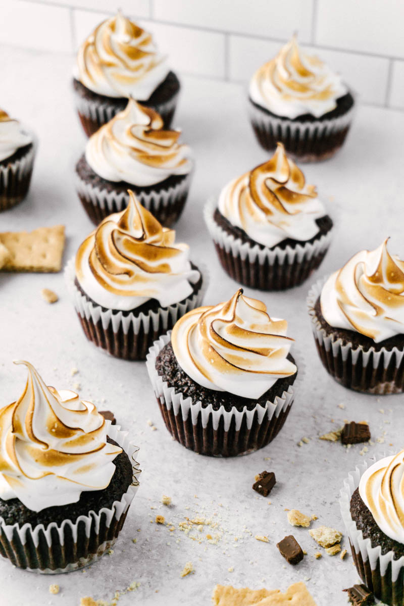 s'mores cupcakes spread out on the table