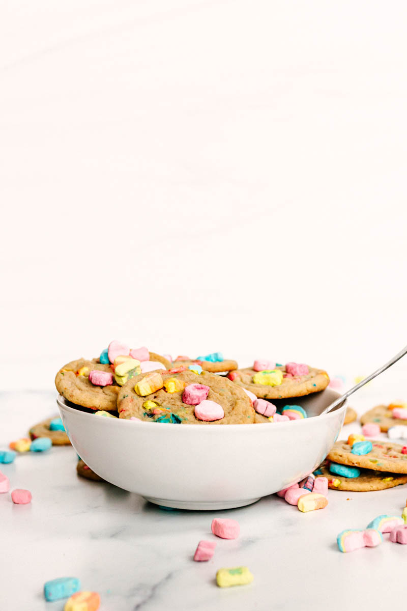 lucky charms cookies in a cereal bowl with a spoon