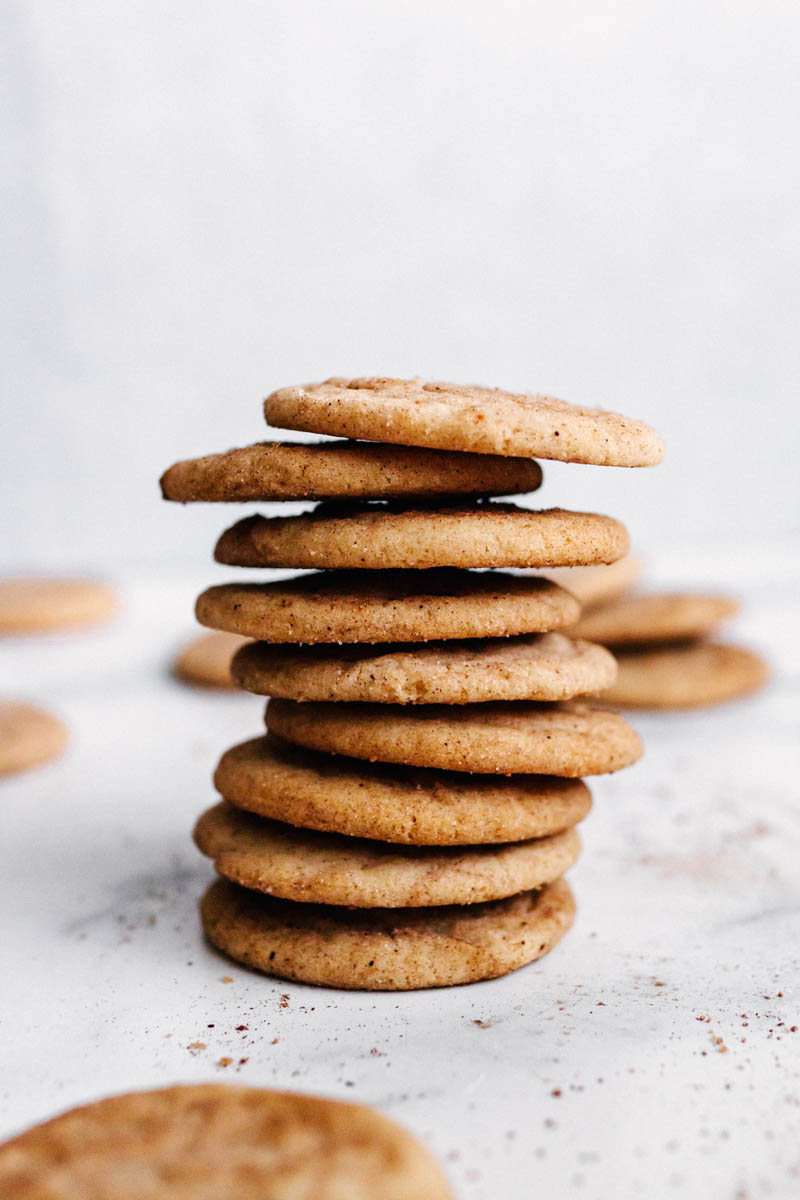 chai sugar cookies stacked on top of each other