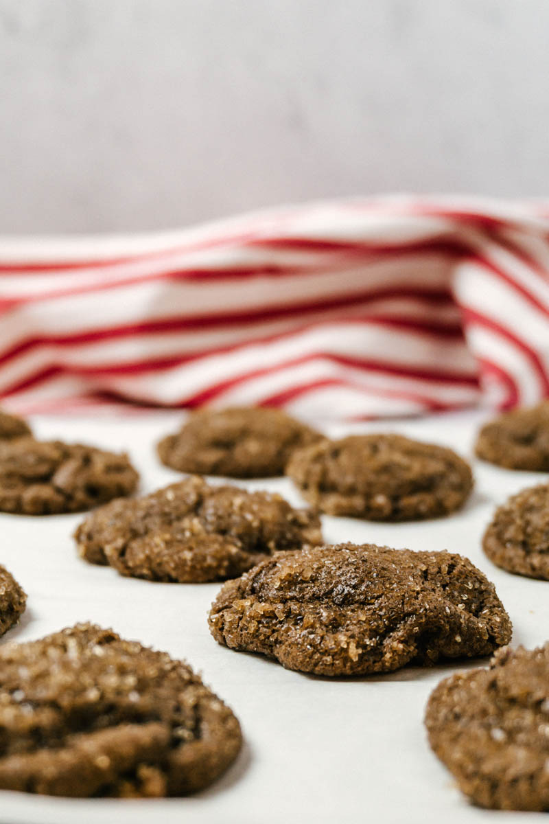 chewy dark chocolate cherry cookies on a baking sheet